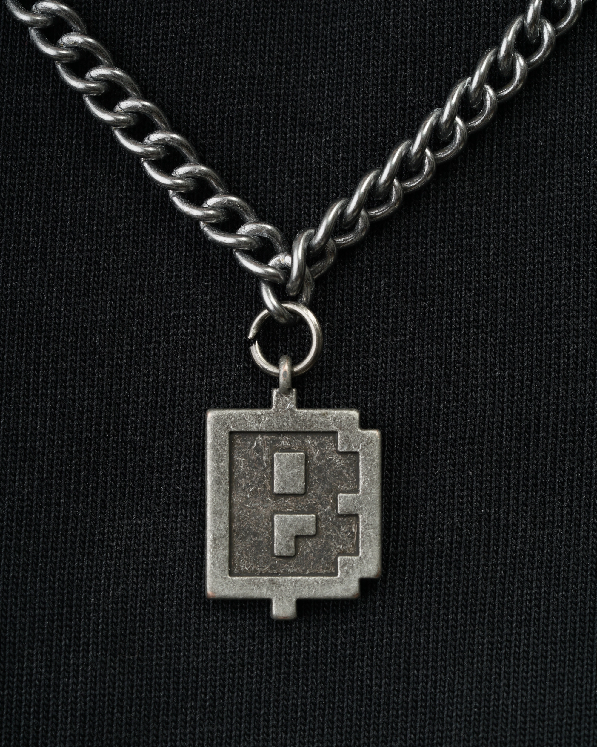 'BLUM' logo necklace