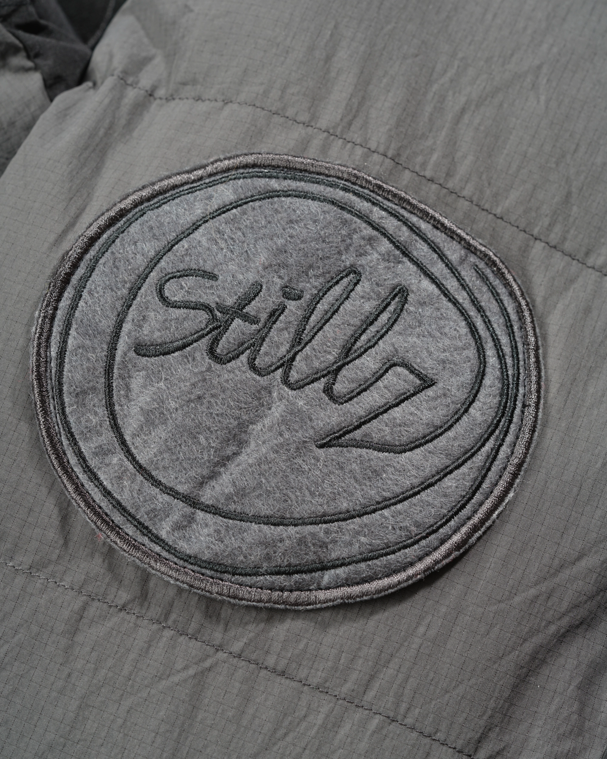 STILLZ® Multi-Symbol Puffer Jacket